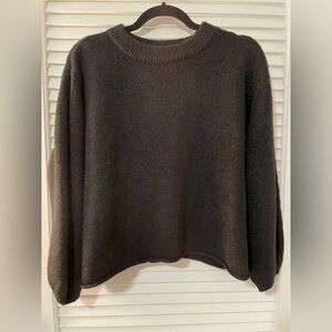 Black sparkly sweater. Never worn. Tags on